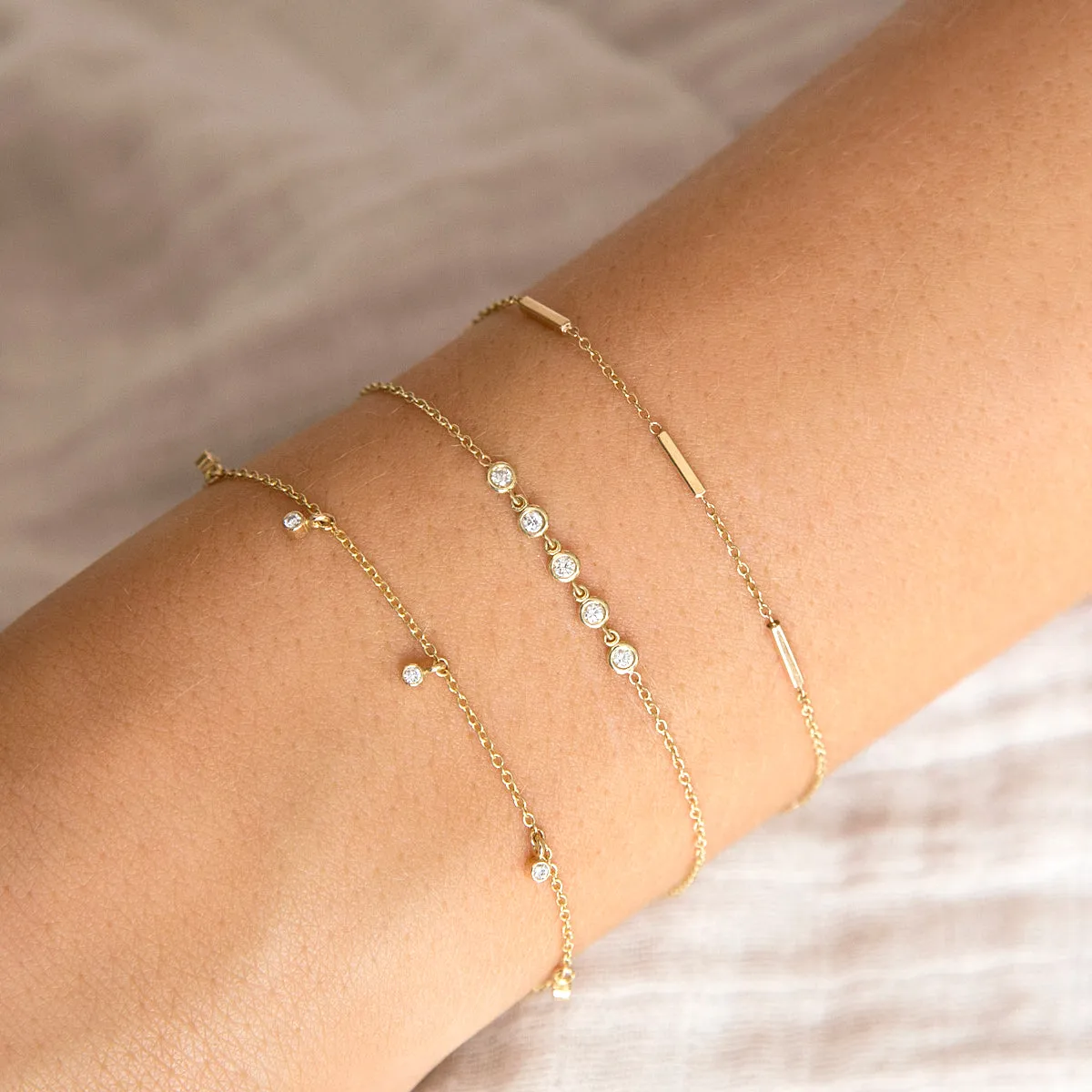 14k 5 Dangling Diamond Bezel Bracelet