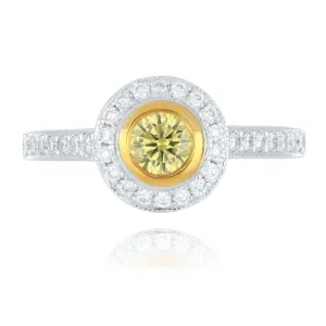 18ct white and yellow gold 0.33ct yellow diamond halo ring with diamond set shoulders