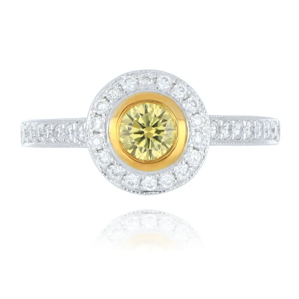 18ct white and yellow gold 0.33ct yellow diamond halo ring with diamond set shoulders
