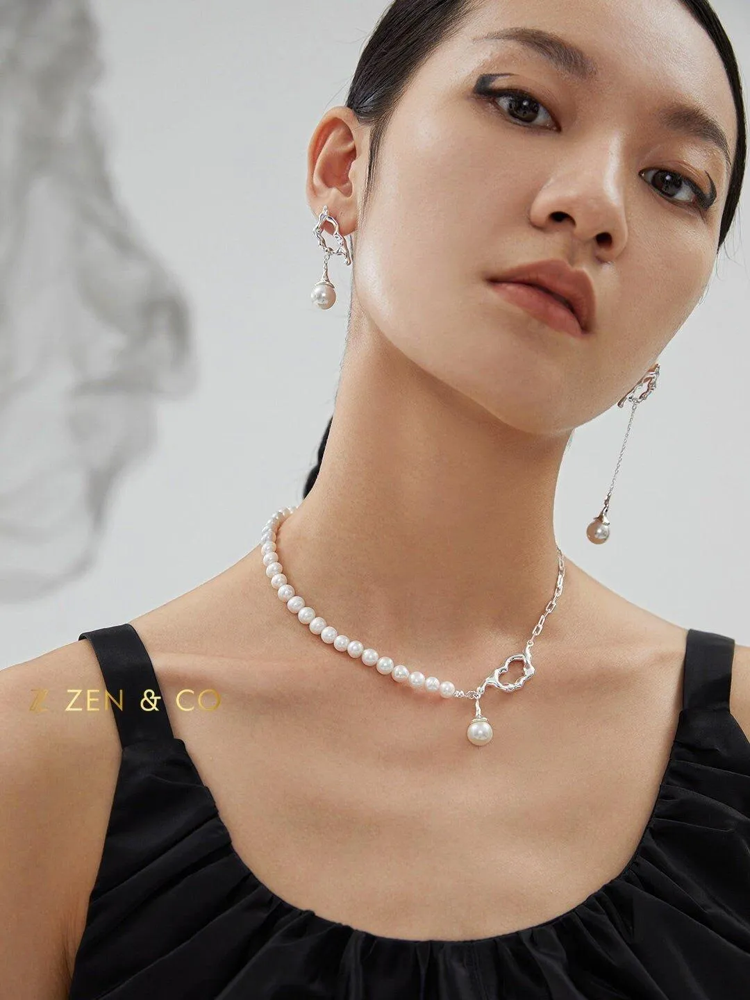 CLAIRE Asymmetric earrings with big dangle pearl