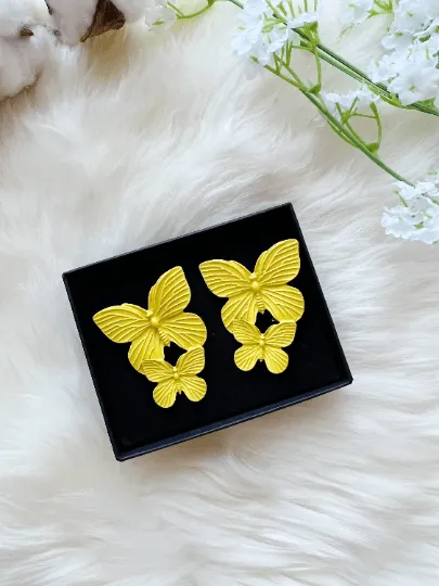 Golden butterfly wings stud earrings | navy blue stud earrings | flying butterflies statement | summer spring garden style