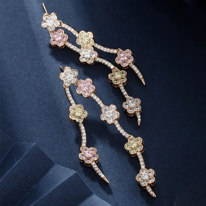 Small fresh forest style small flower tassel earrings for women, long style, sweet, age-reducing and smart temperament