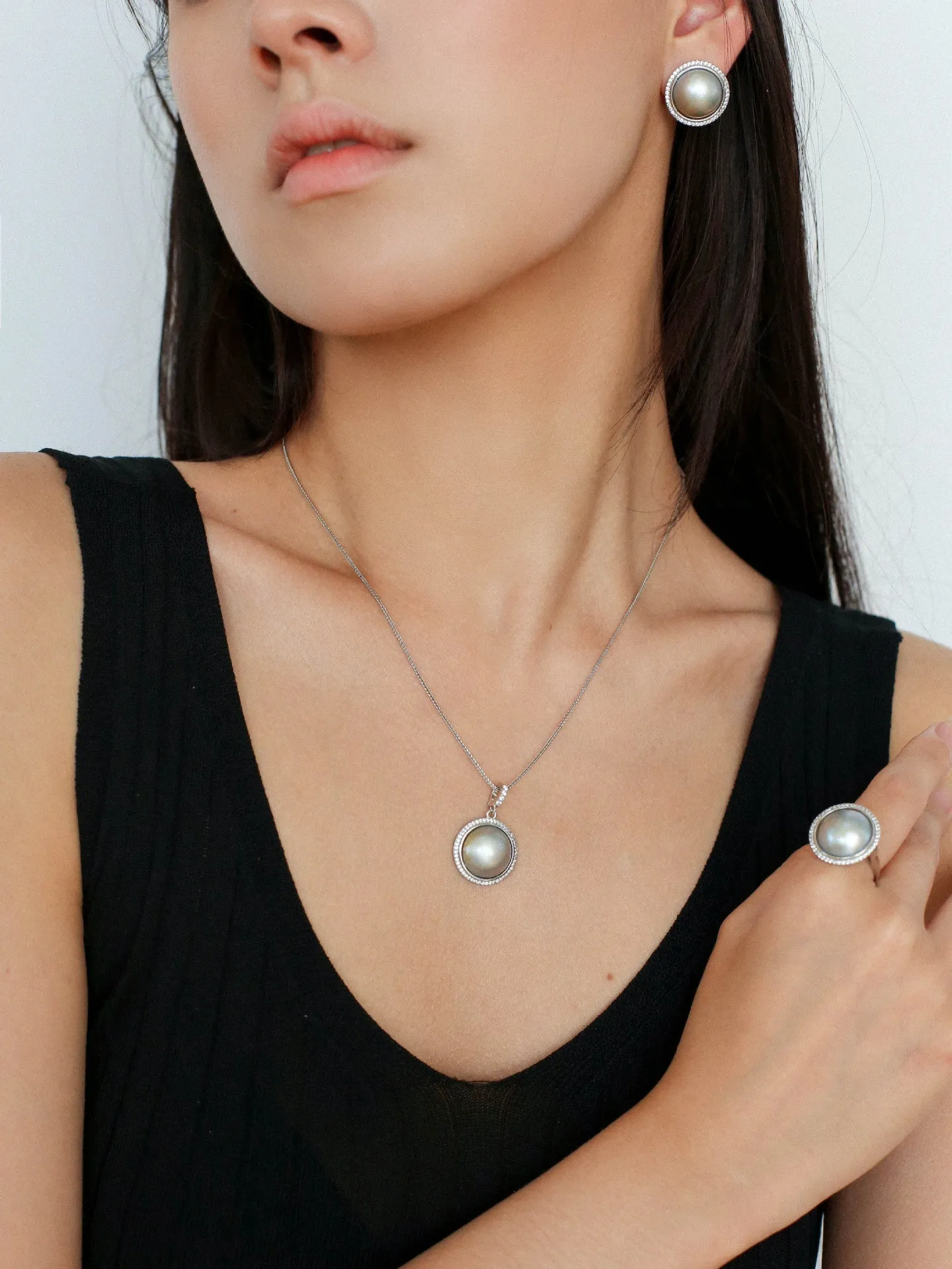 Surrounding Diamond Mabe Pearl Ring